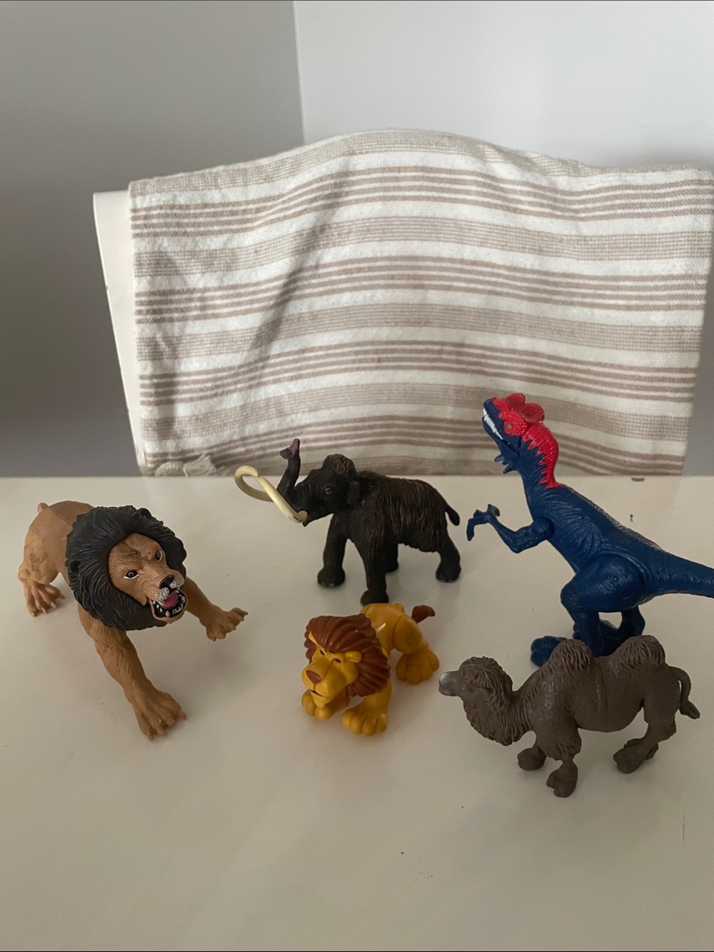 Assorted Animal Figure Lot - Lions, Mammoths & More in Brown, Yellow, Blue